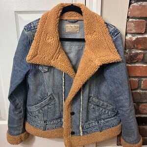 We The Free Rylee moto denim jacket with faux fur trim.
